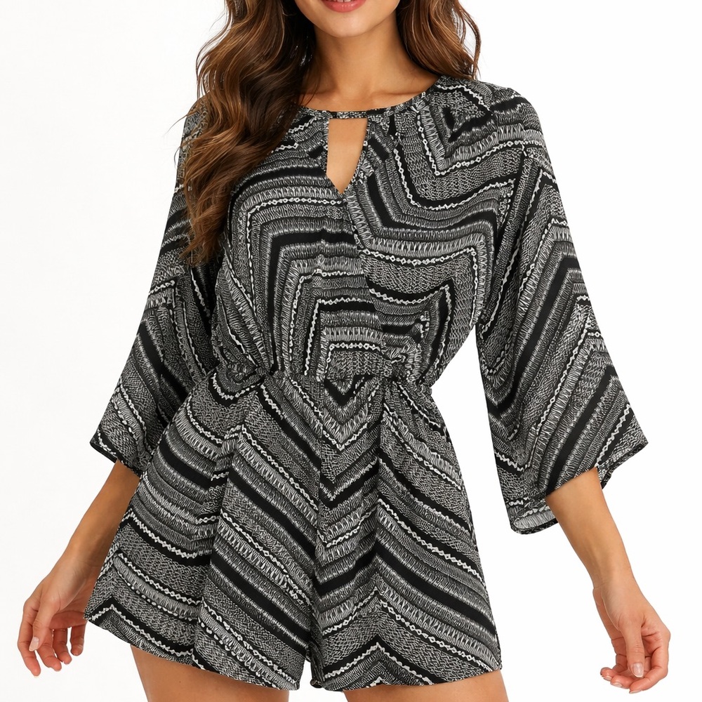 Very cute black and white Shorts Romper.